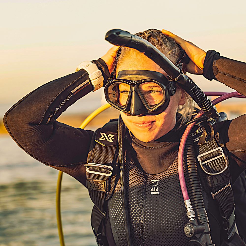 Diver talking with shop staff in Michigan